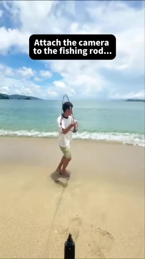 attach a camera to a fishing rod...